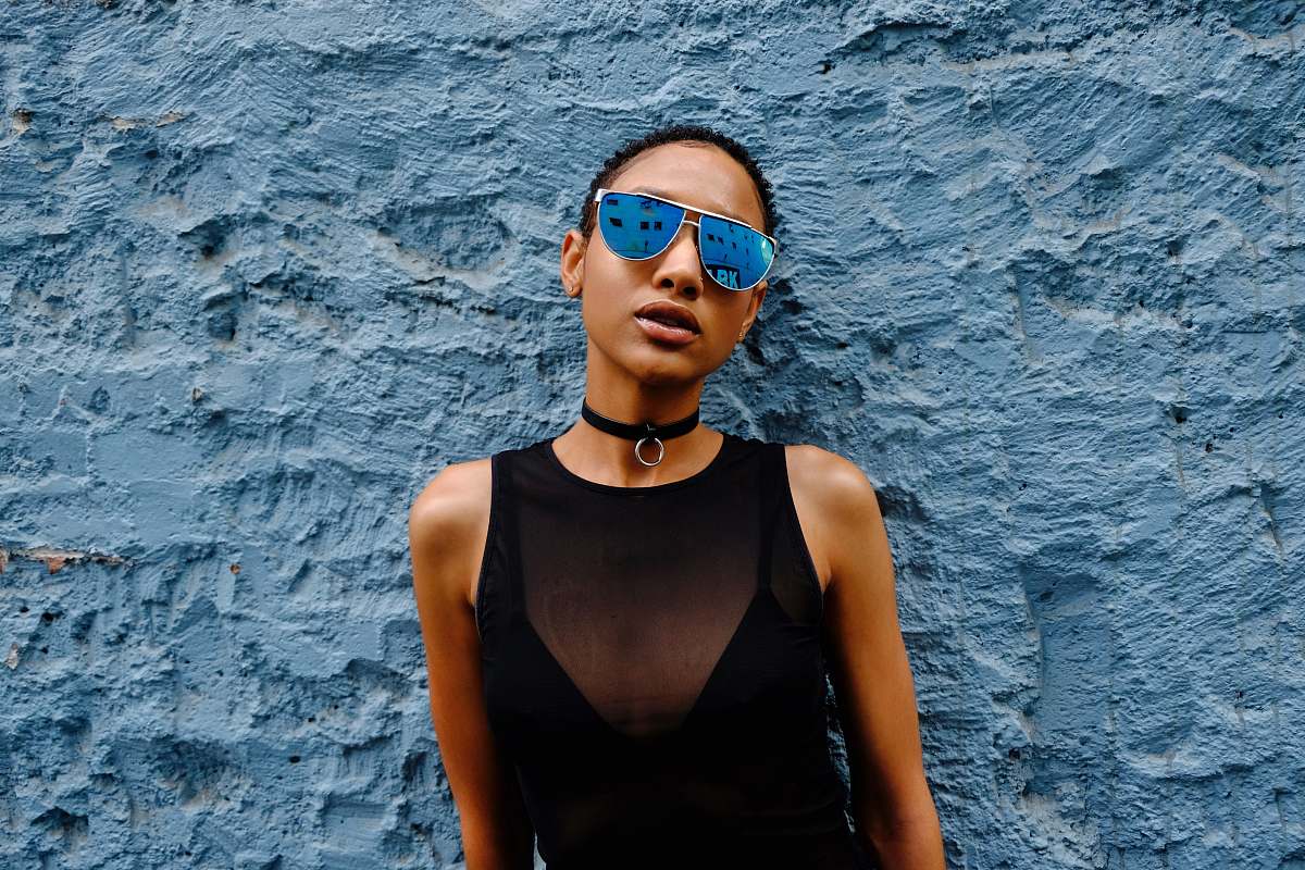 human woman standing in front of wall people