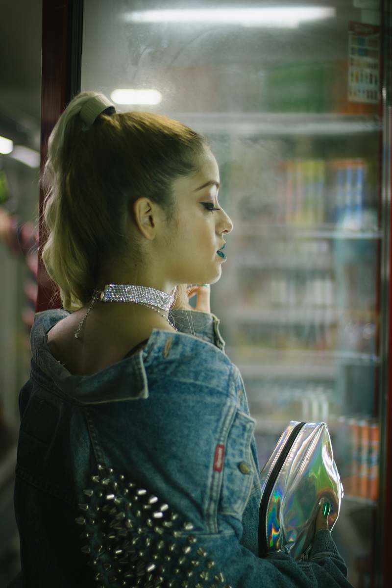 people woman standing near the glass facade human