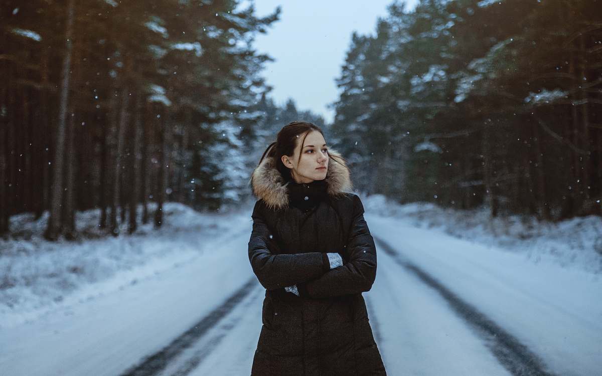 human woman standing on snow field people