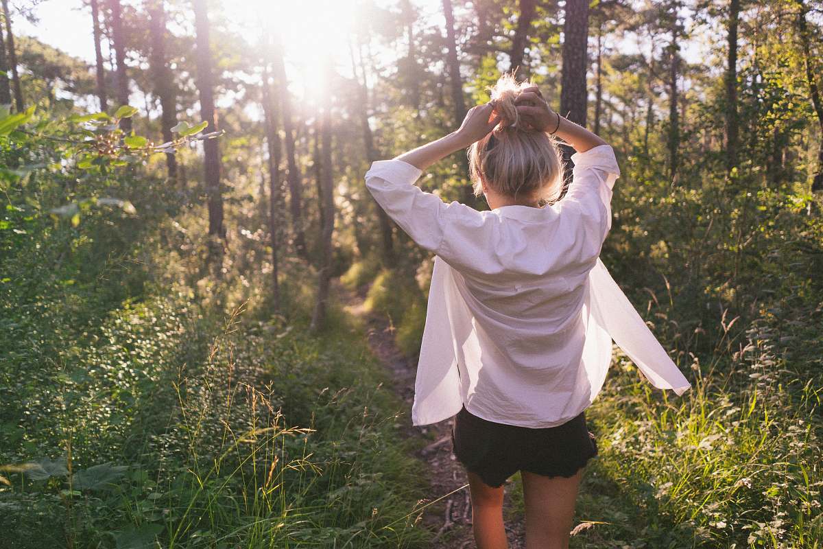 human woman standing on the forest at daytime people