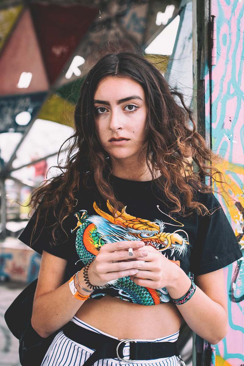 human woman standing with cigarette on hands people