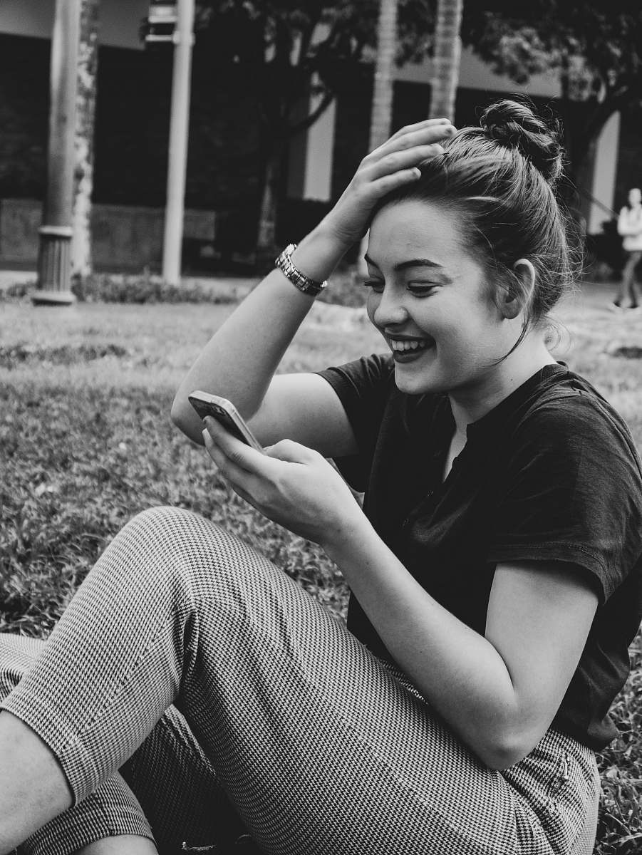 people woman using smartphone black-and-white