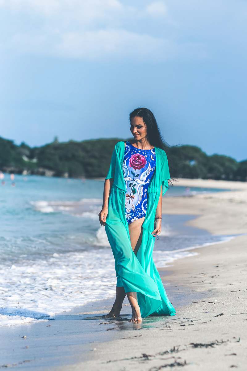 human woman walking in the beach during daytime people