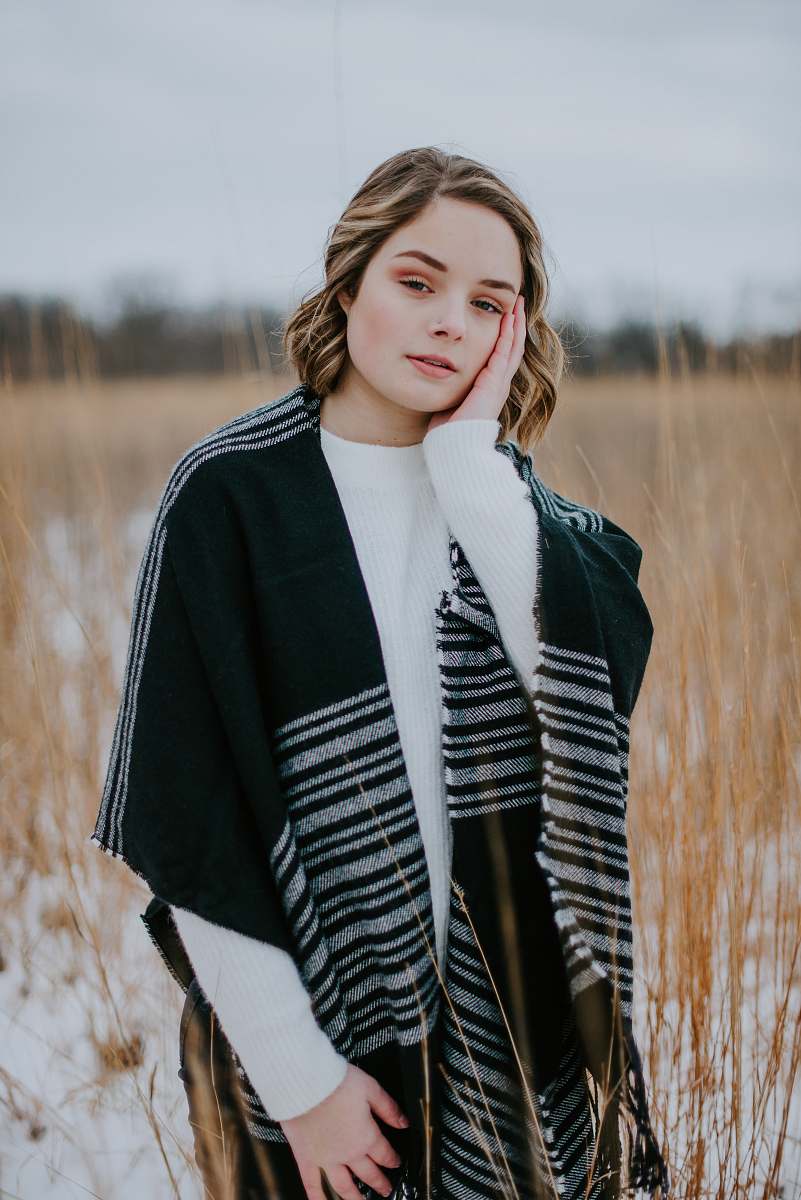human woman wearing black cardigan people