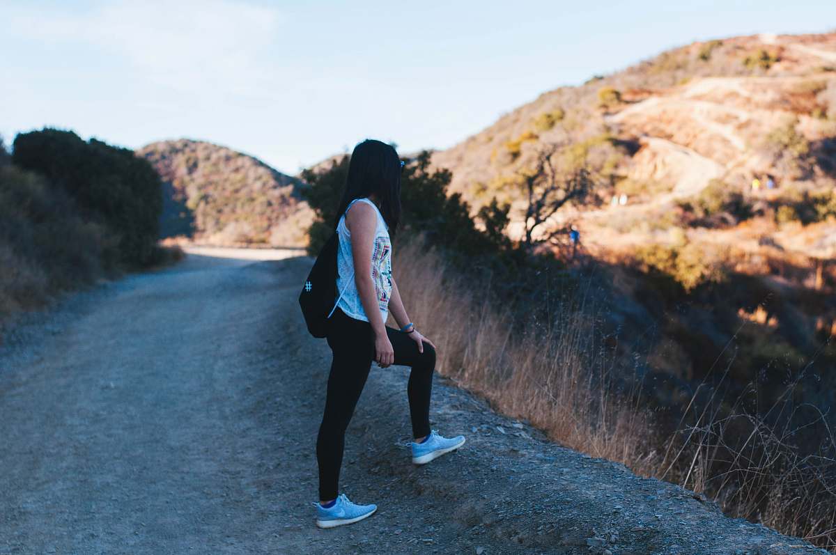 people woman wearing black leggings standing human