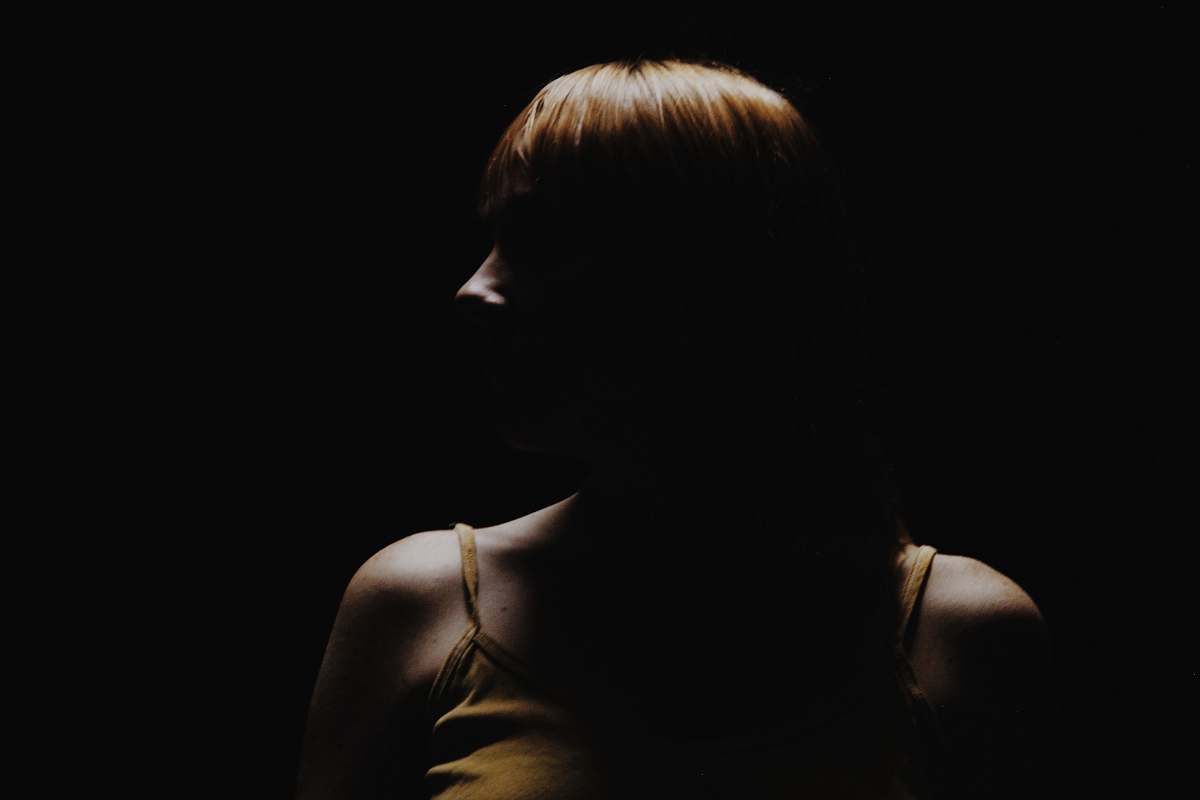 people woman wearing brown camisole top human