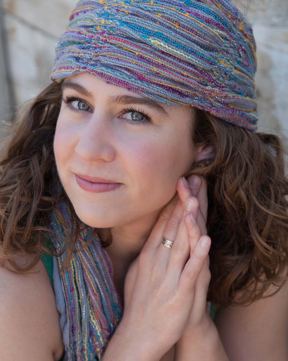human woman wearing headdress holding both arms people