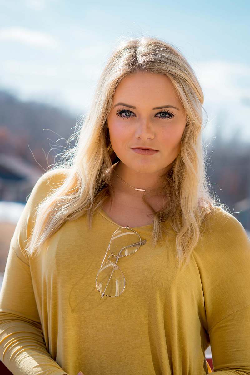 human woman wearing yellow scoop-neck long-sleeved shirt people