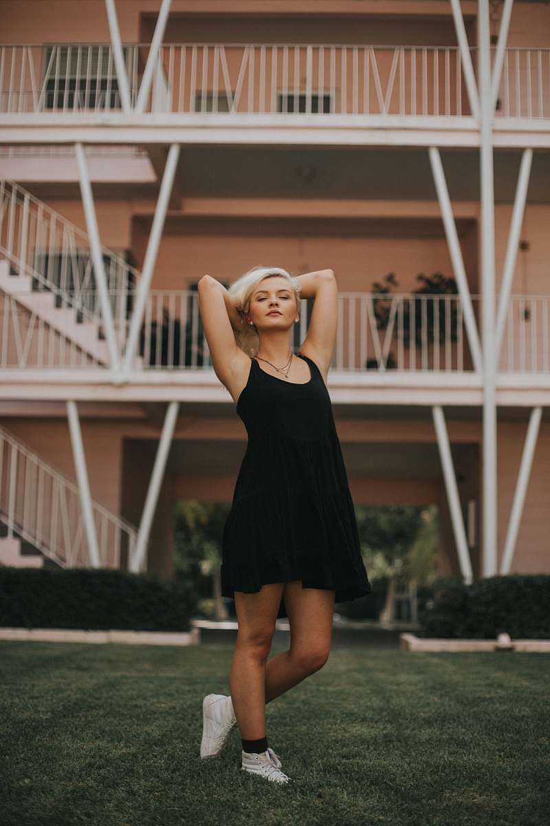 human women's black spaghetti strap dress people