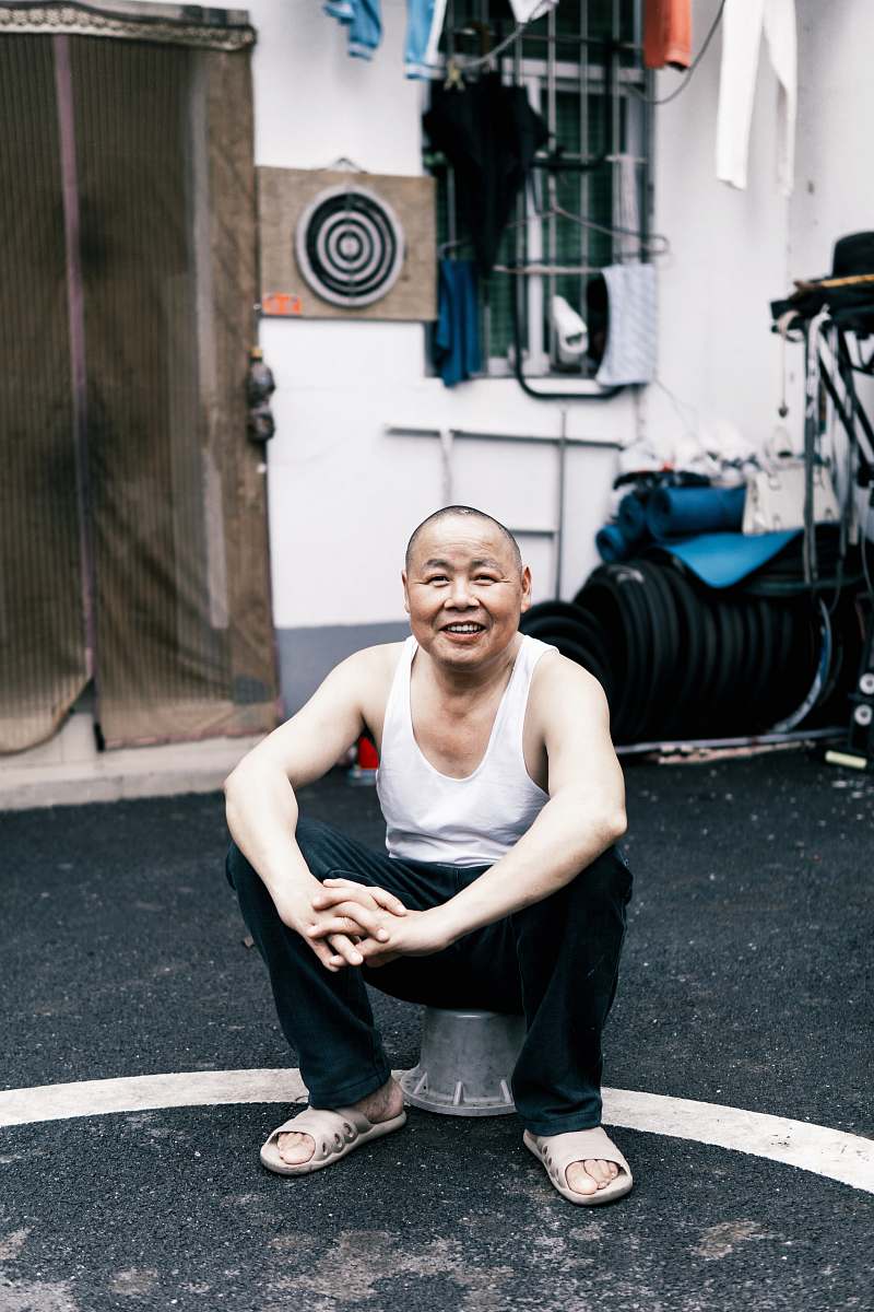 clothing man sitting on bucket footwear
