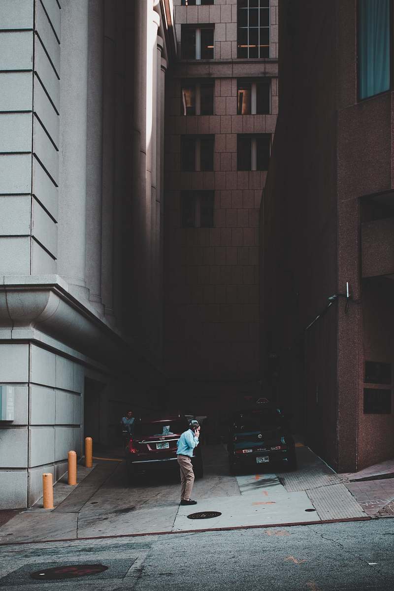 luggage man walking street suitcase