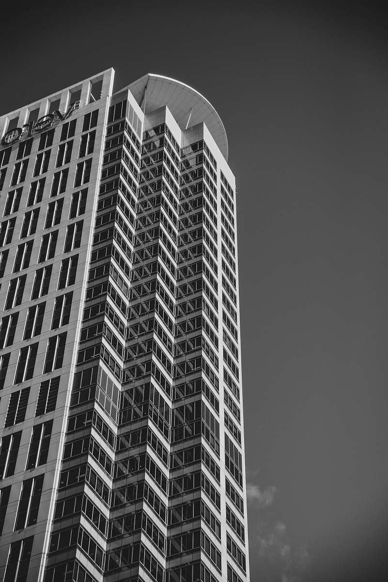 town high-rise concrete building during day building
