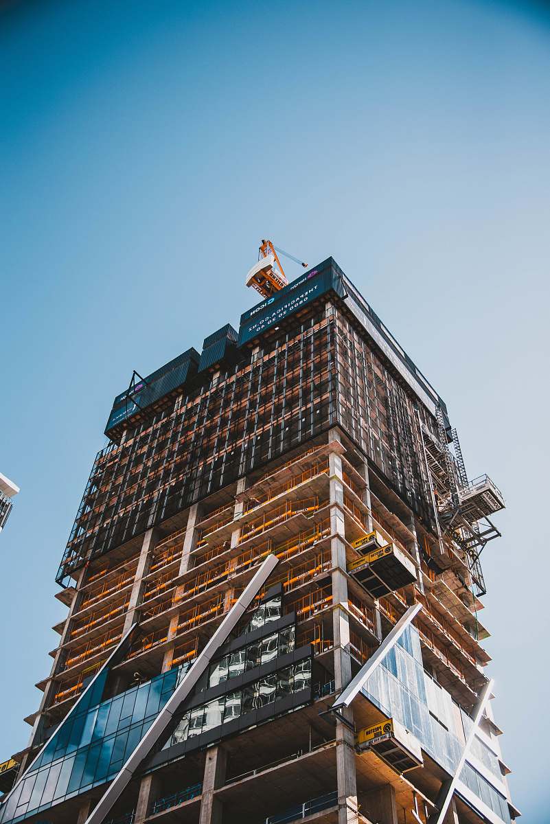 town brown and gray building under construction construction