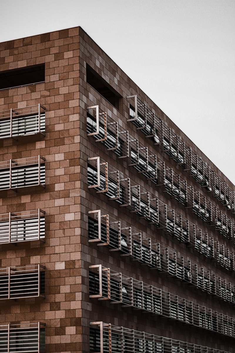 city brown concrete building office building