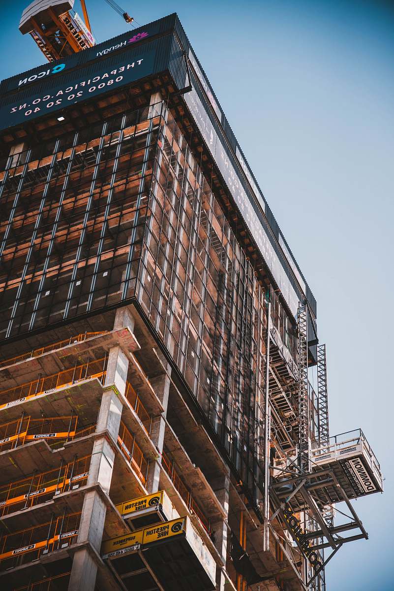 construction low angle photography of building scaffolding