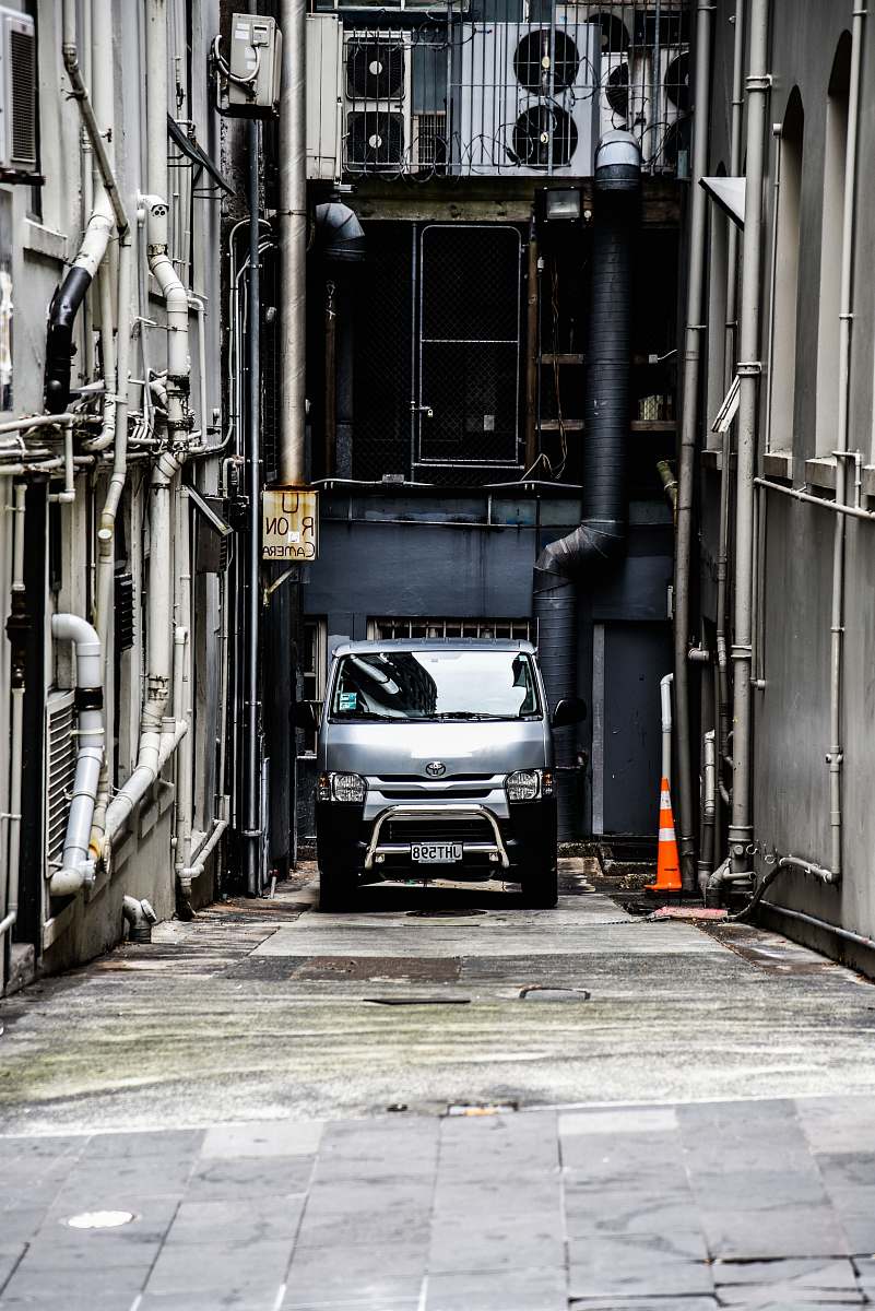 automobile parked gray vehicle in corner car
