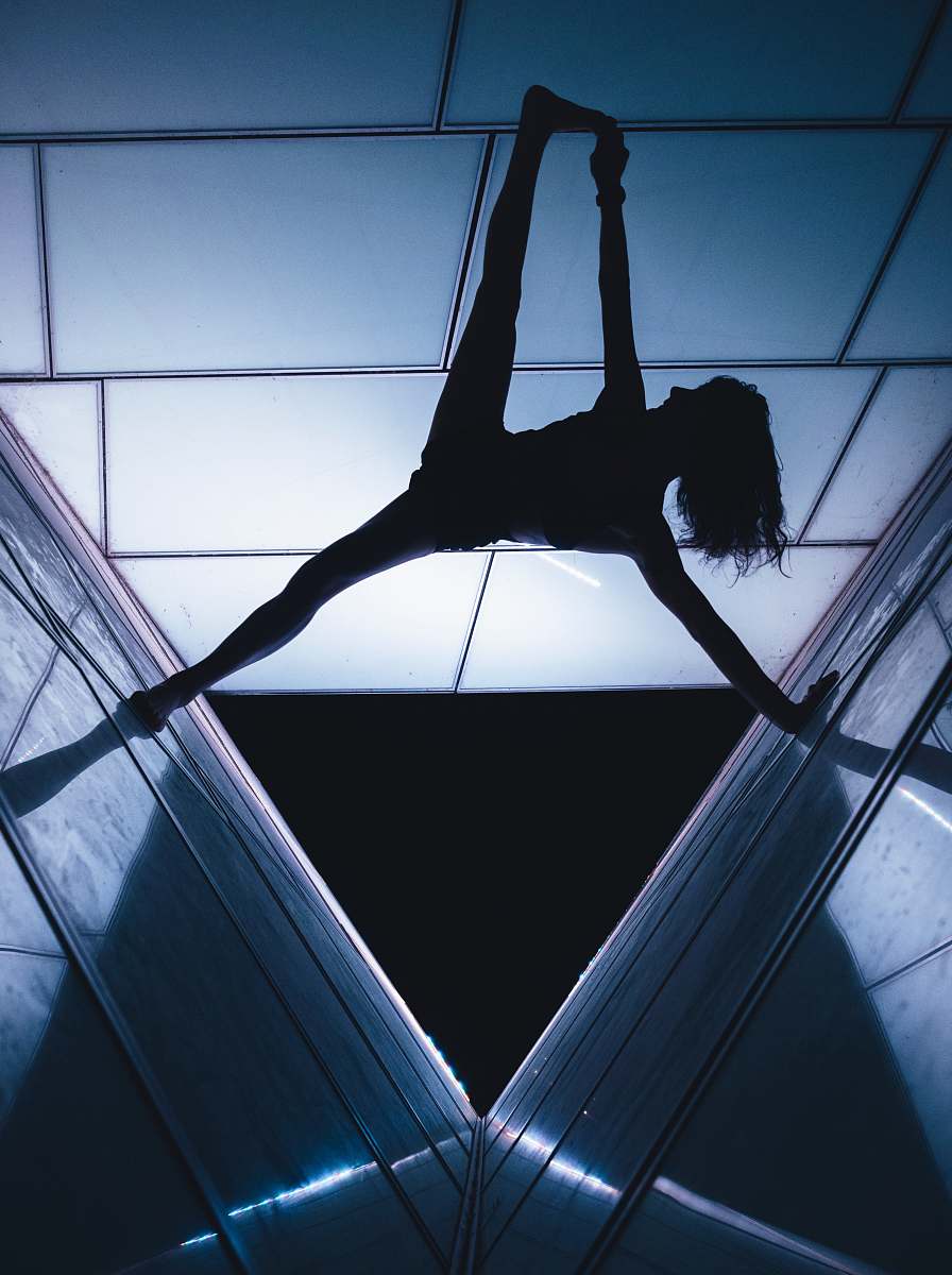 skylight silhouette of woman window