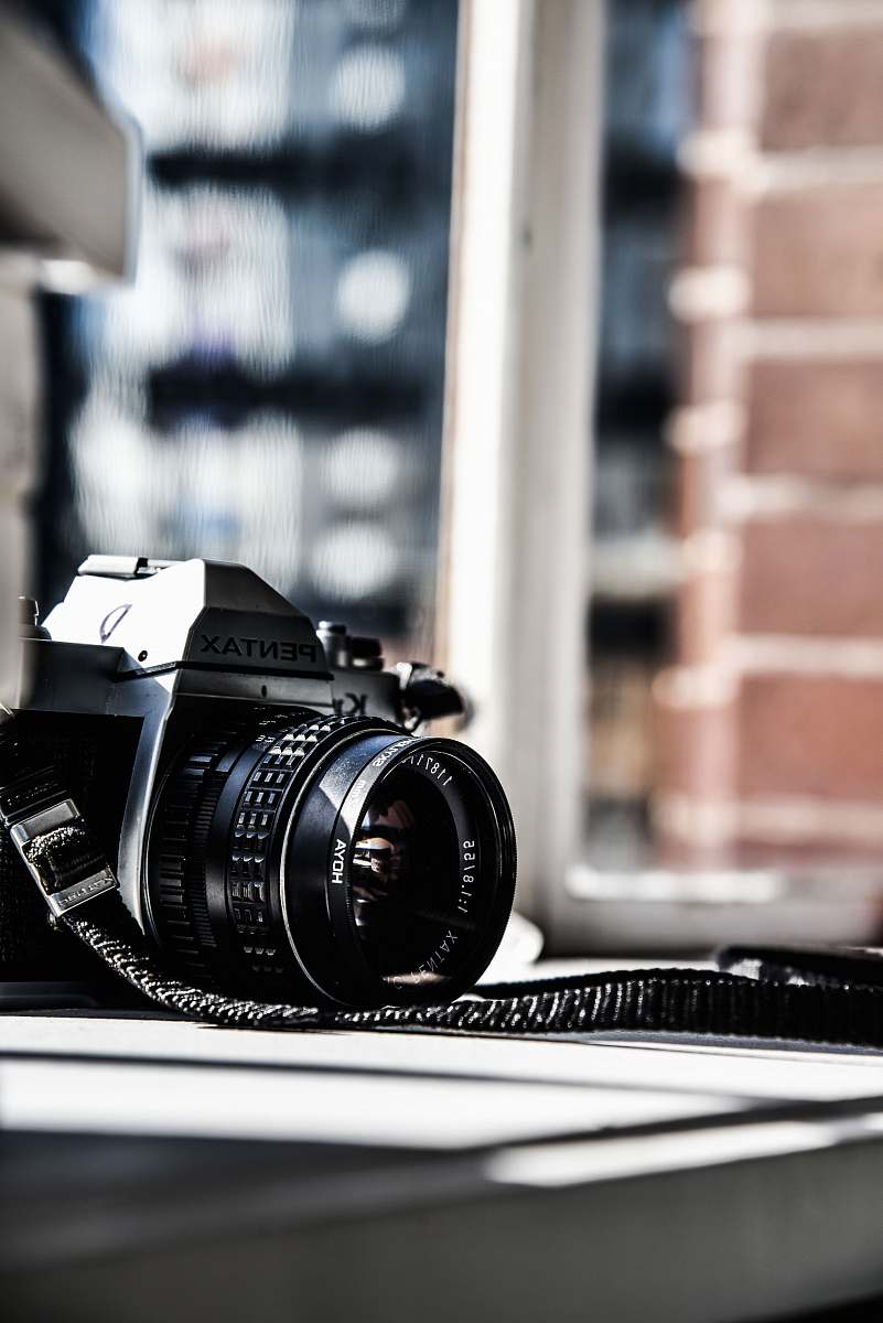 electronics black and gray Pentax SLR camera strap