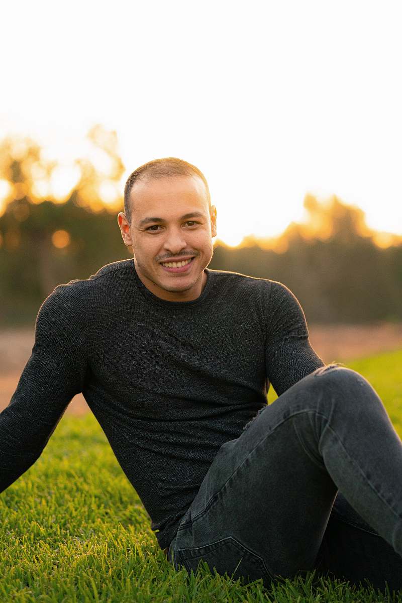 apparel man in black sweater sleeve