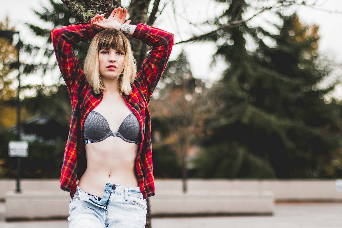 person woman unbuttonted top human