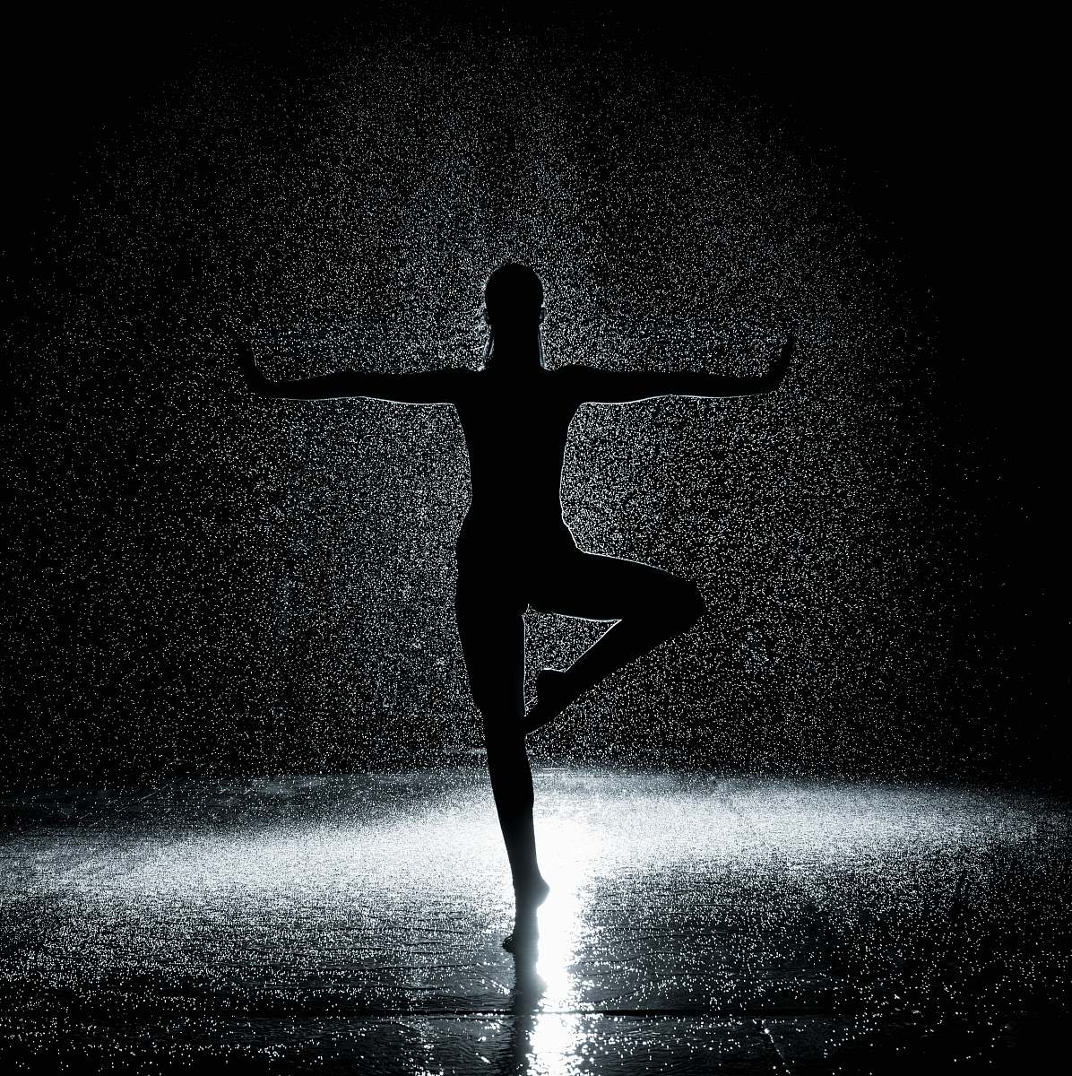 symbol woman in posture under rain dance