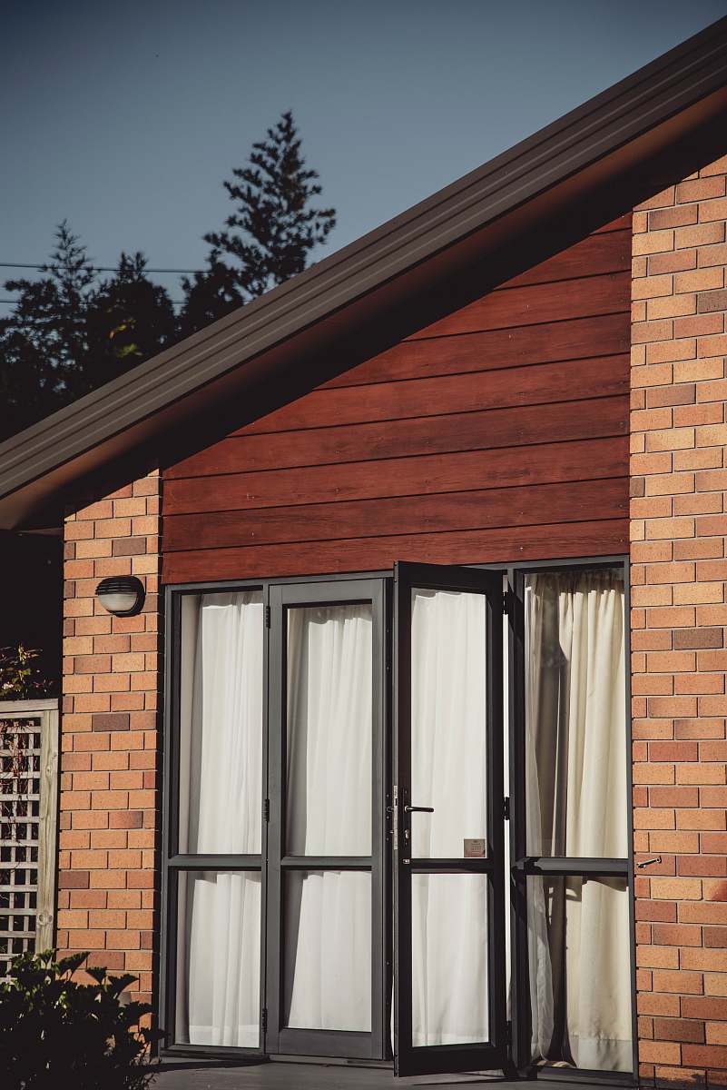 lonely close up photography of house window ocean