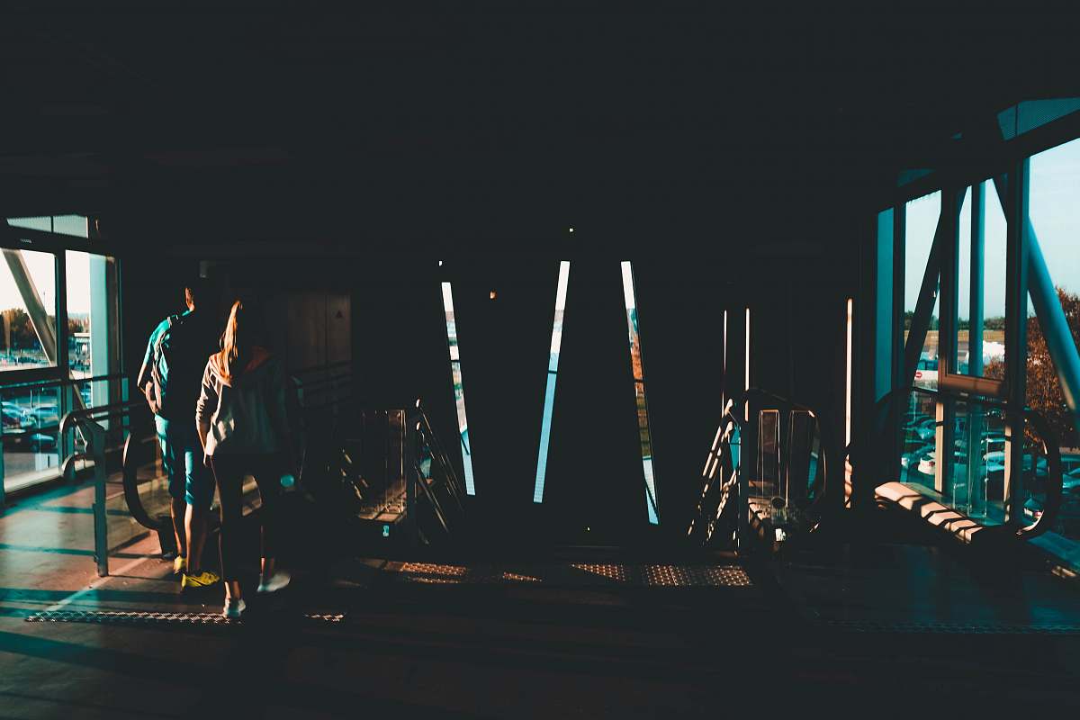france two people standing on wooden floor stage