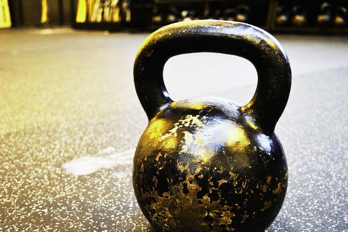 gym black kettle bell on floor kettlebell