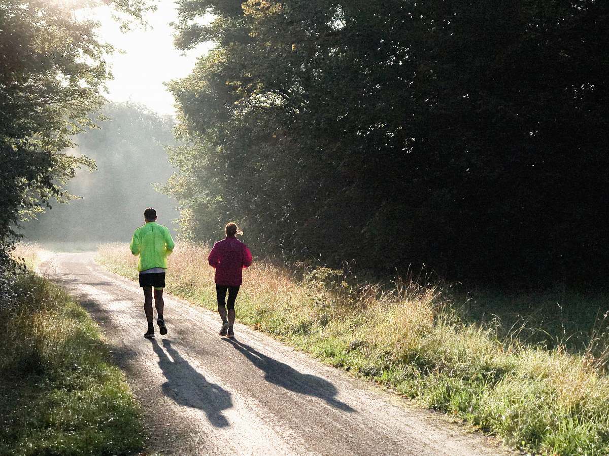 person two person jogging during daytime human
