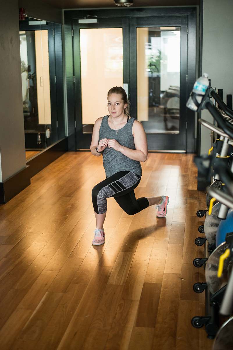 exercise woman wearing gray and black sport pants human