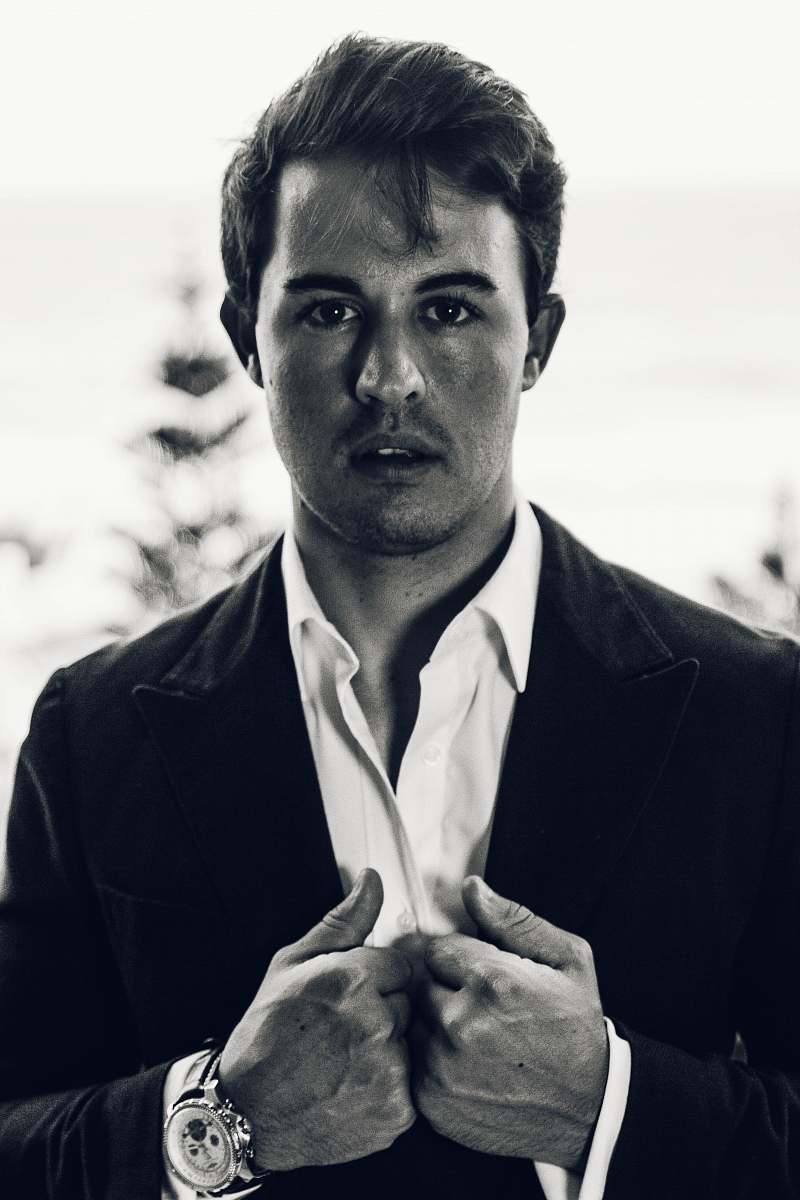 person man in black blazer suit