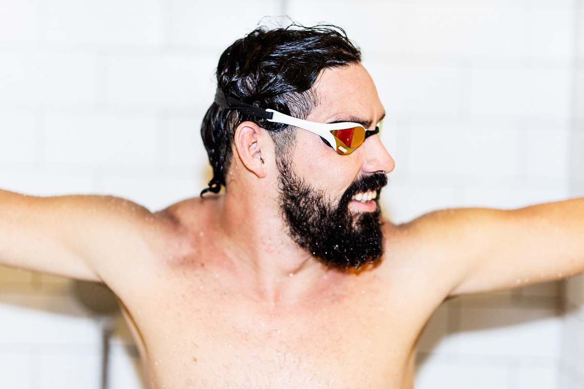 person man in white swim goggles people