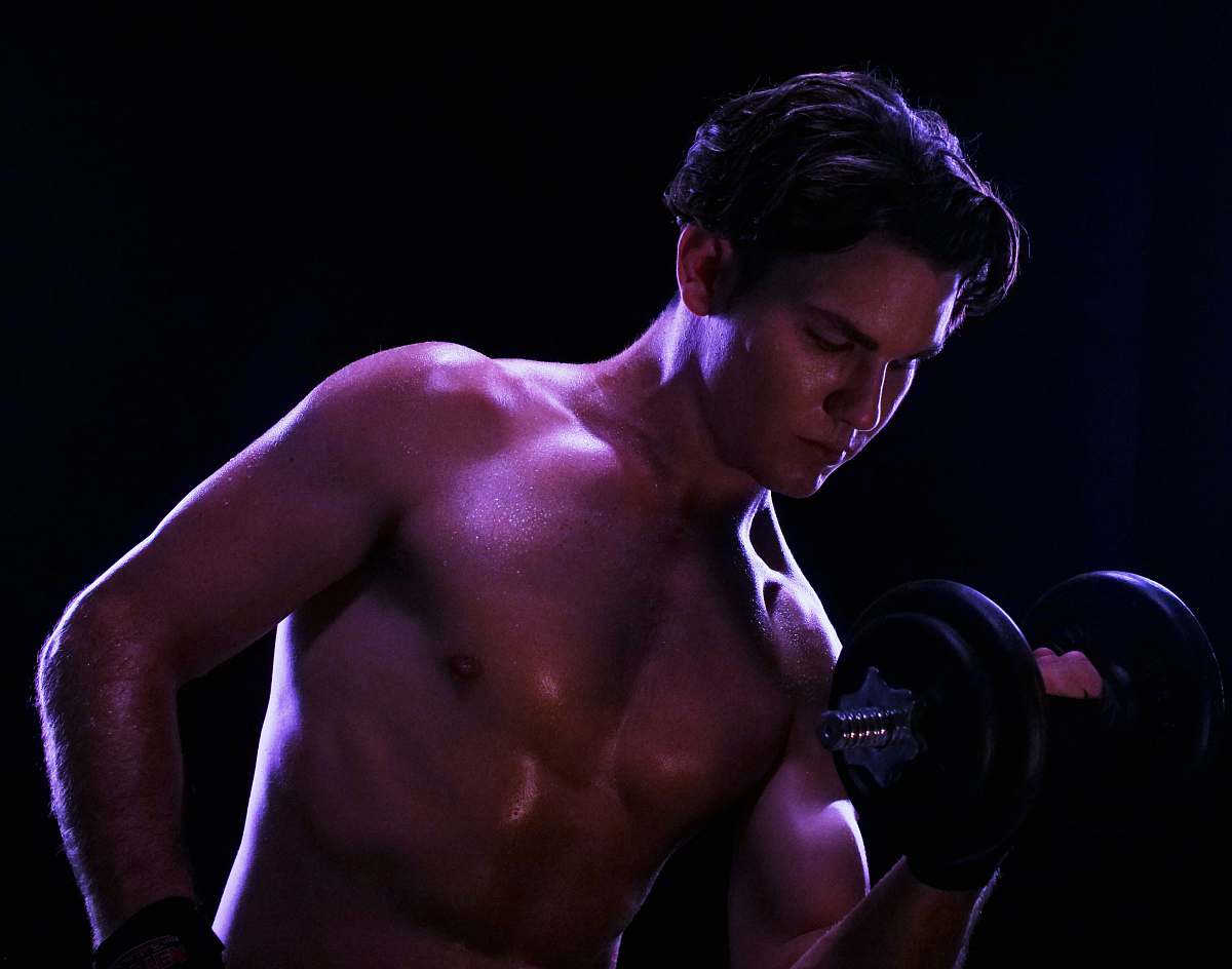 person man lifting dumbbell sport