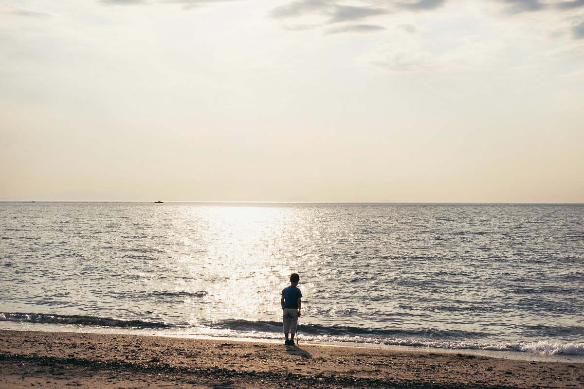 person man near ocean working out