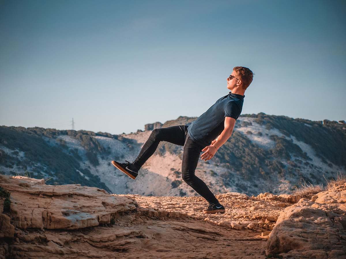person man on hill outdoors