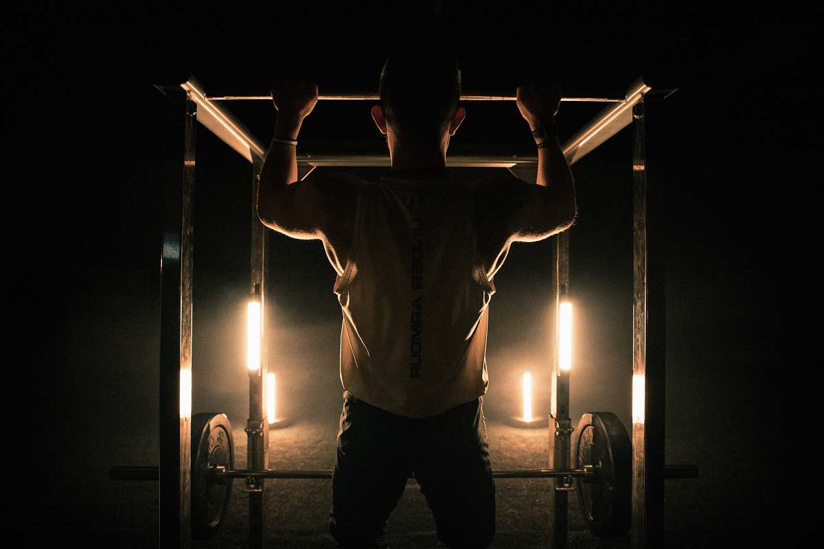 person man on power rack flare