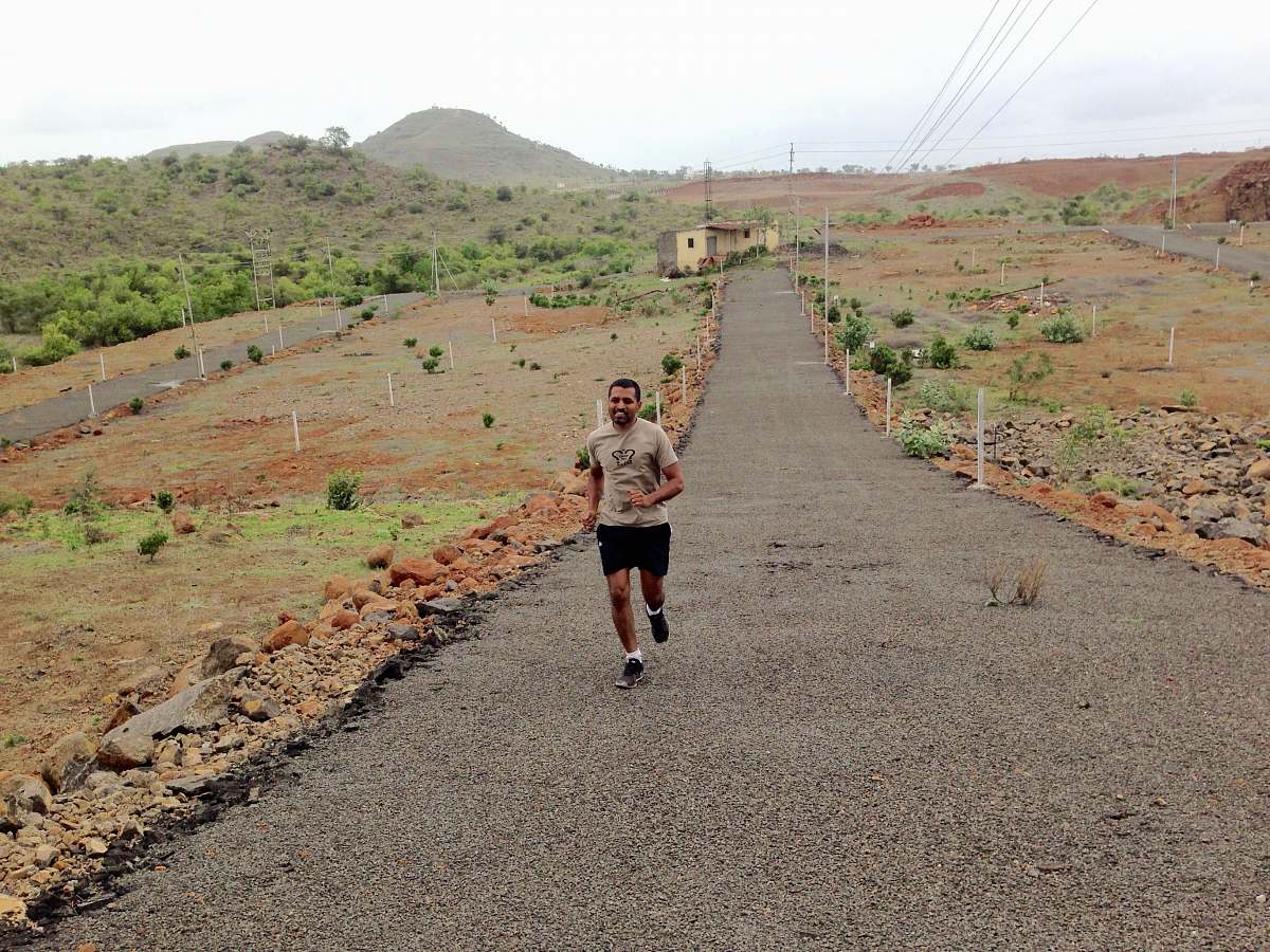 person man running during daytime fitness