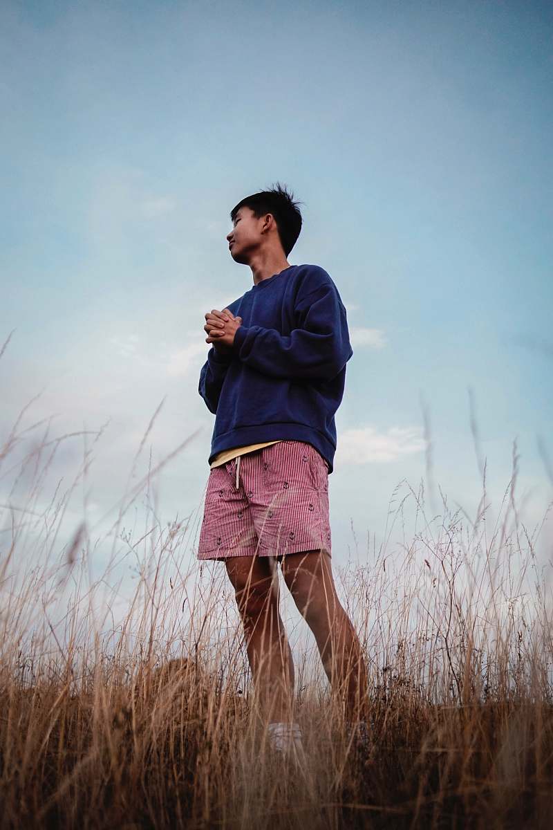 person man standing on the field people