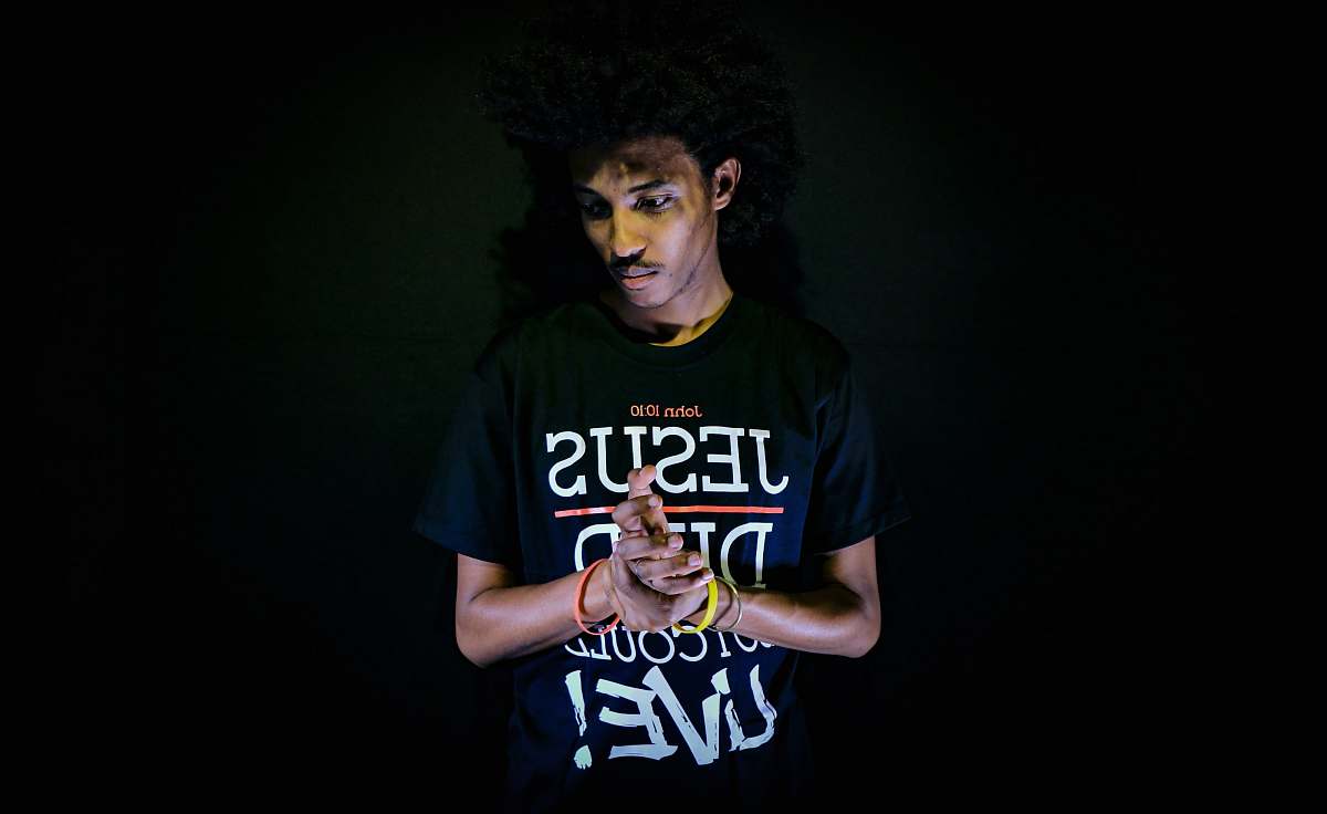 person man wearing blue crew-neck shirt people