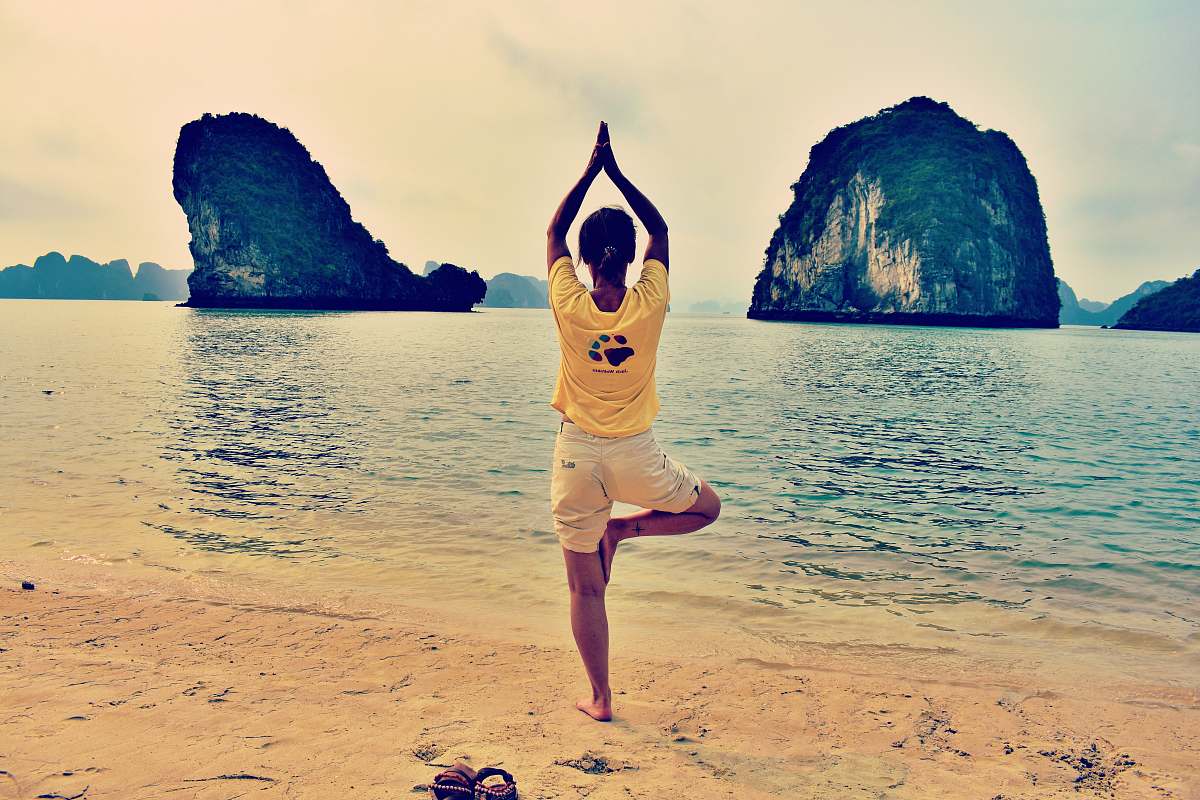 person man wears yellow crew-neck t-shirt on the seashore sport