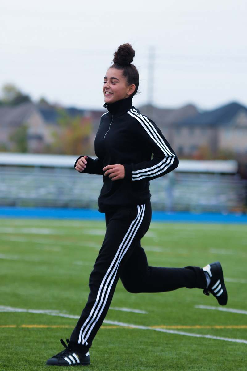person running girl during daytime people