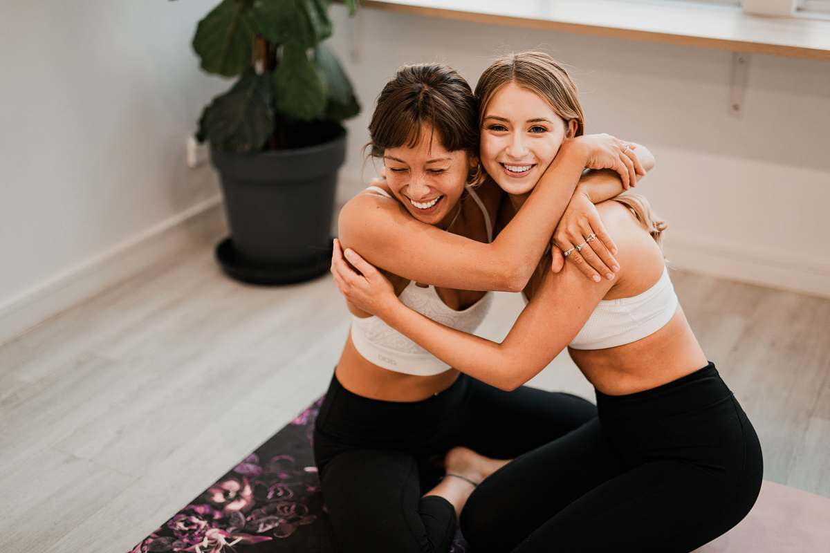 person shallow focus photo of white sports bra face