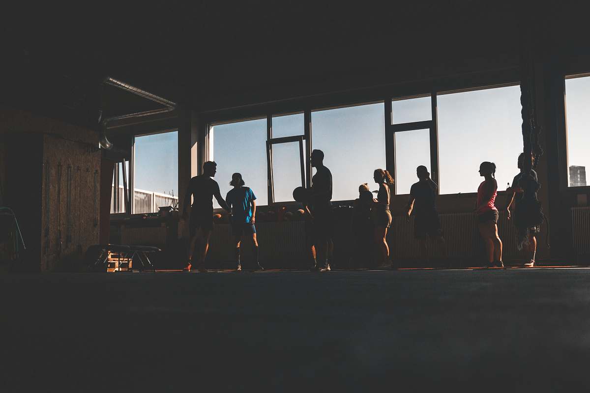 person silhouette of people near window grey