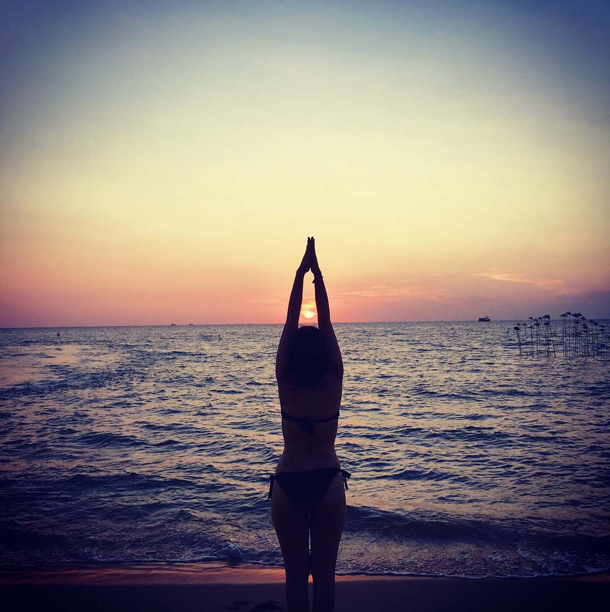 sports silhouette photography of woman raising her hands sport
