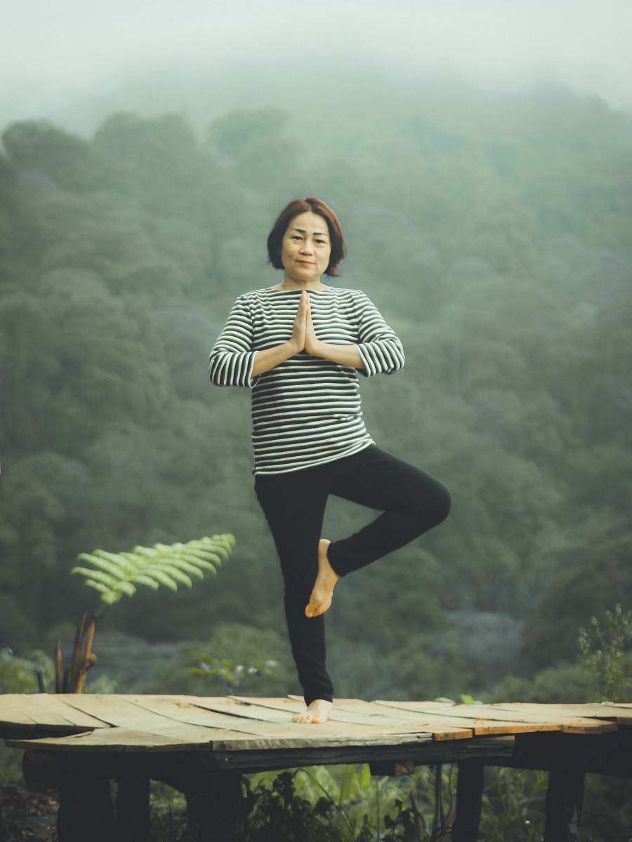 person woman doing exercise at daytime female