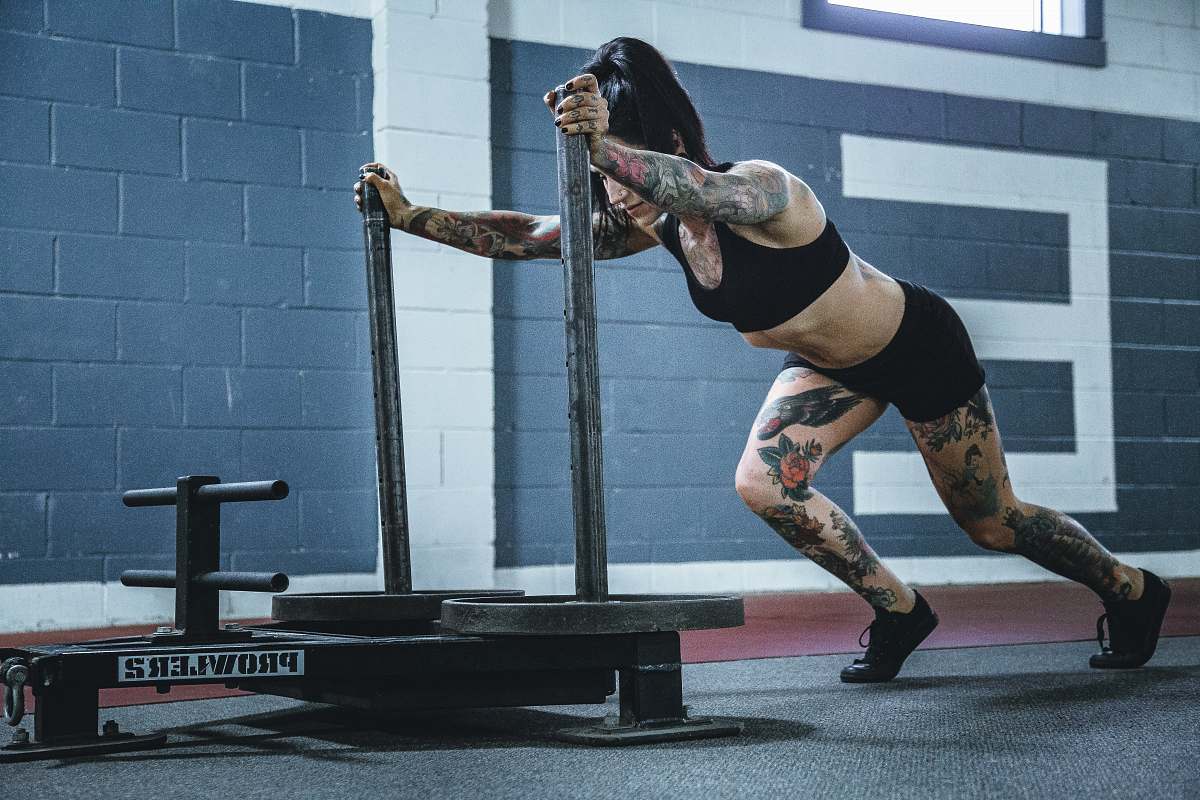 person woman doing workout in room people