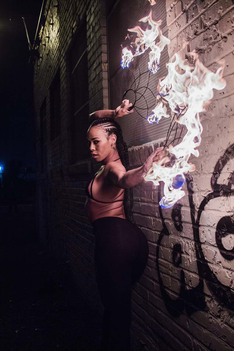 person woman fire dancing people