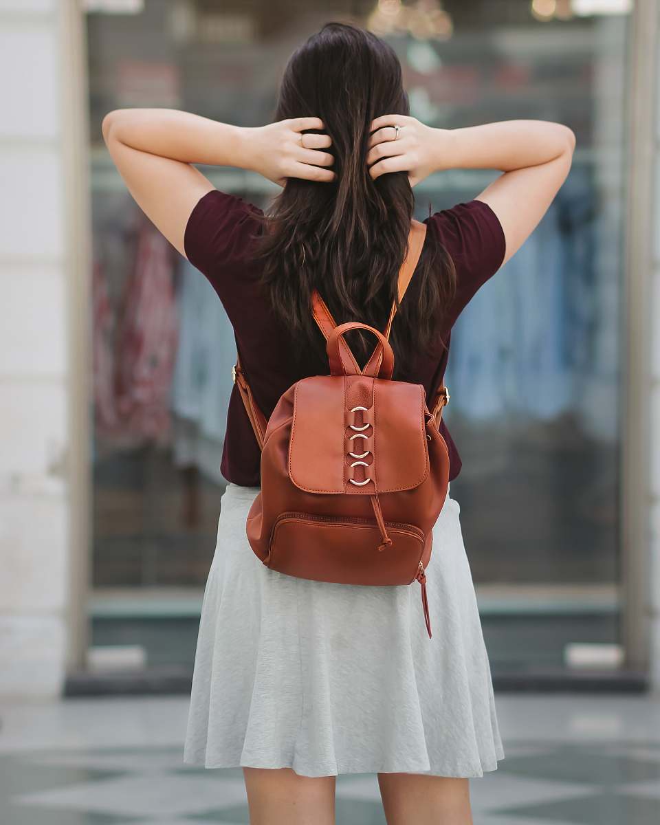 person woman holding her hair with both hands people
