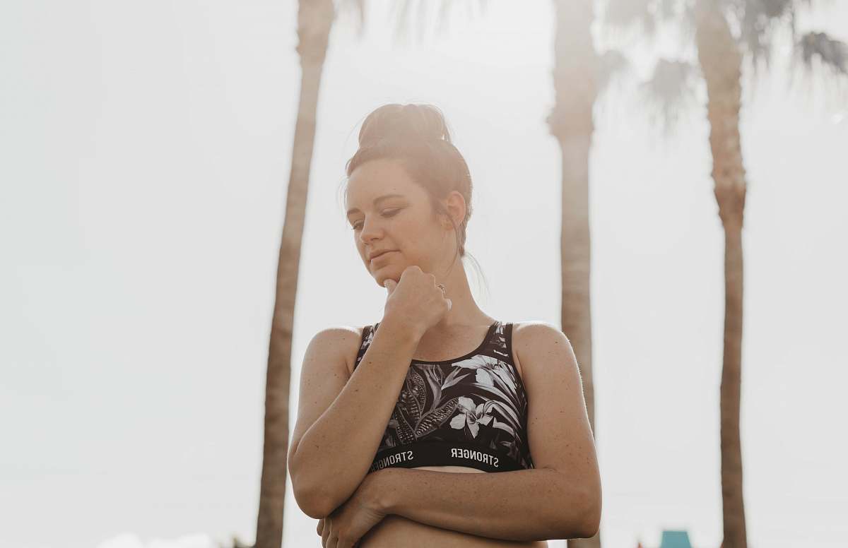 clothing woman in black crop-top beside trees apparel