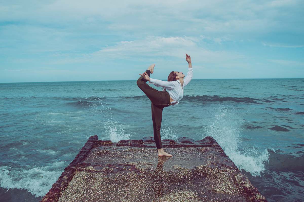 person woman in black pants outdoors